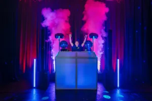 large DJ rig with blue purple light smoke DJ HAMEZ Smoke Jets last minute dj cover